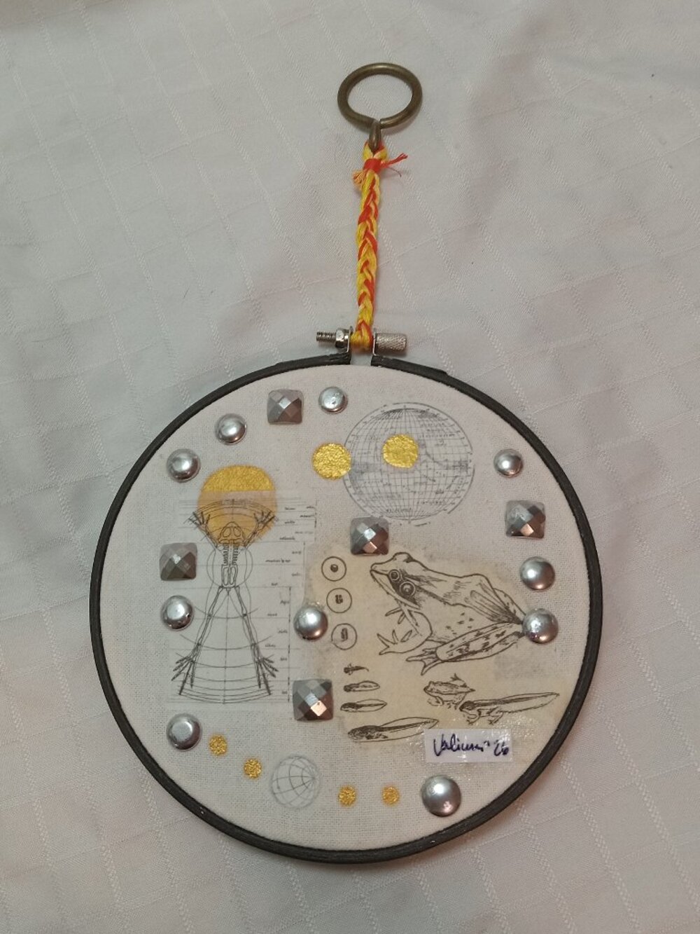 Handmade prints of old magazines on cotton & mixed media in a cross-stitch hoop